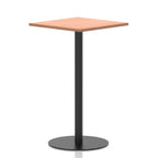 Square high table with a wood-effect top and black cylindrical base on a white background