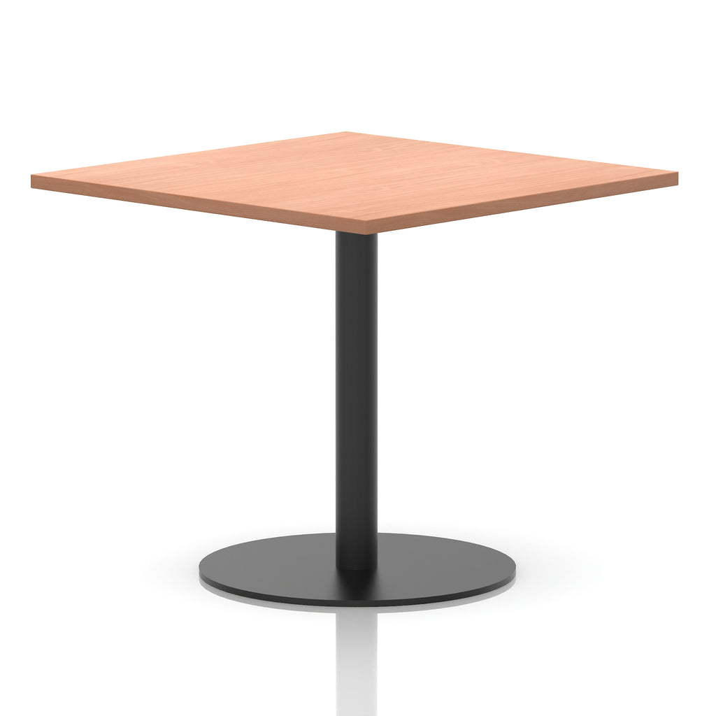 Square table with a wood-effect top and black cylindrical base on a white background
