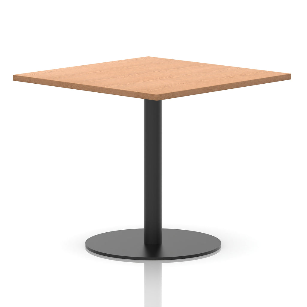 Square table with a wood-effect top and black cylindrical base on a white background