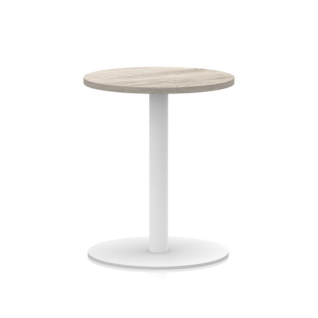 Round table with wood-effect top and white base on a white background