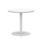 White round table with metal base on a white background