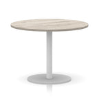Round table with wood-effect top and white base on a white background