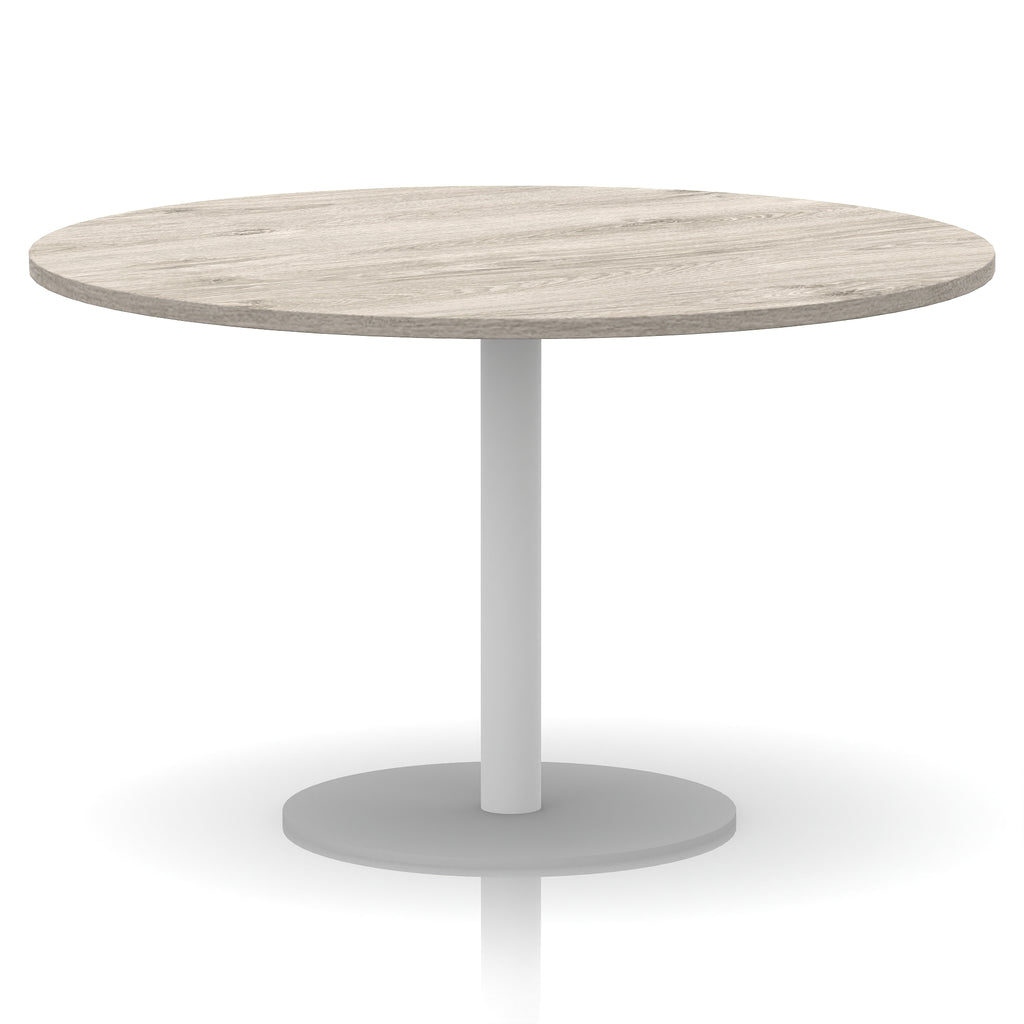 Round table with wood-effect top and white base on a white background