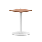 Square table with wood-effect top and white round base on a white background