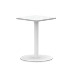 White table with square top and round base on a white background