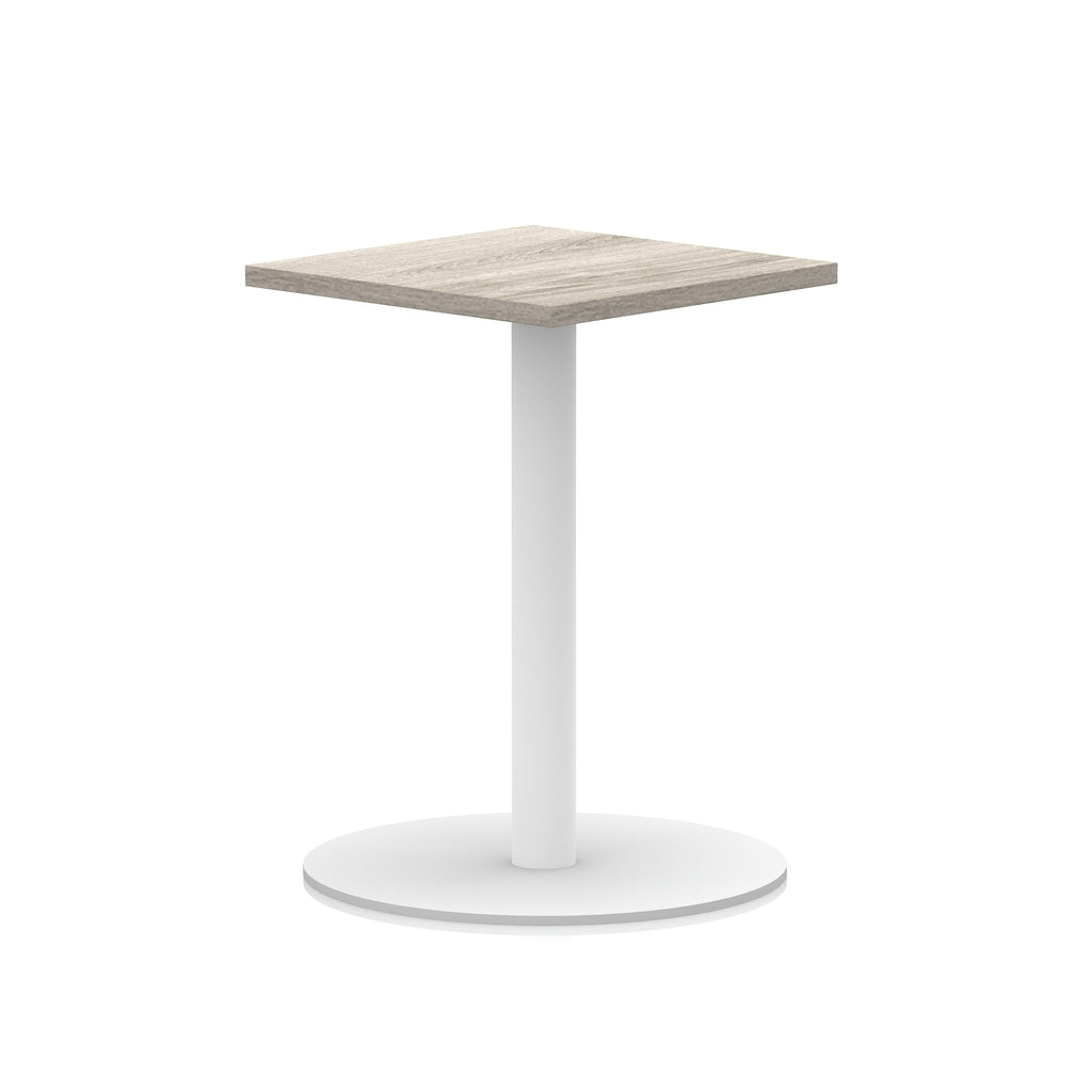 Square table with wood-effect top and white round base on a white background