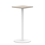 Square high table with wood-effect top and white round base on a white background