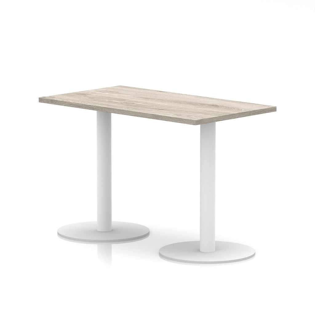 Rectangular table with wood-effect top and white legs on a white background