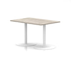 Rectangular table with wood-effect top and white legs on a white background