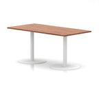 Rectangular table with wood-effect top and white legs on a white background