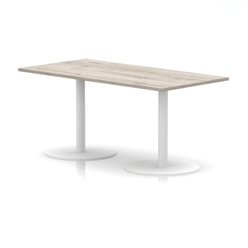 Rectangular table with wood-effect top and white legs on a white background