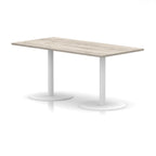 Rectangular table with wood-effect top and white legs on a white background