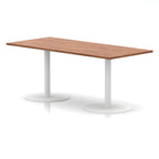 Rectangular table with wood-effect top and white legs on a white background