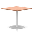 Square table with wood-effect top and white round base on a white background