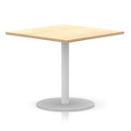 Square table with wood-effect top and white round base on a white background