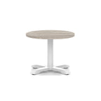 Round coffee table with grey wood-effect top and white metal base on a white background