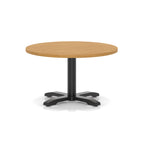 Round coffee table with wood-effect top and black metal base on a white background
