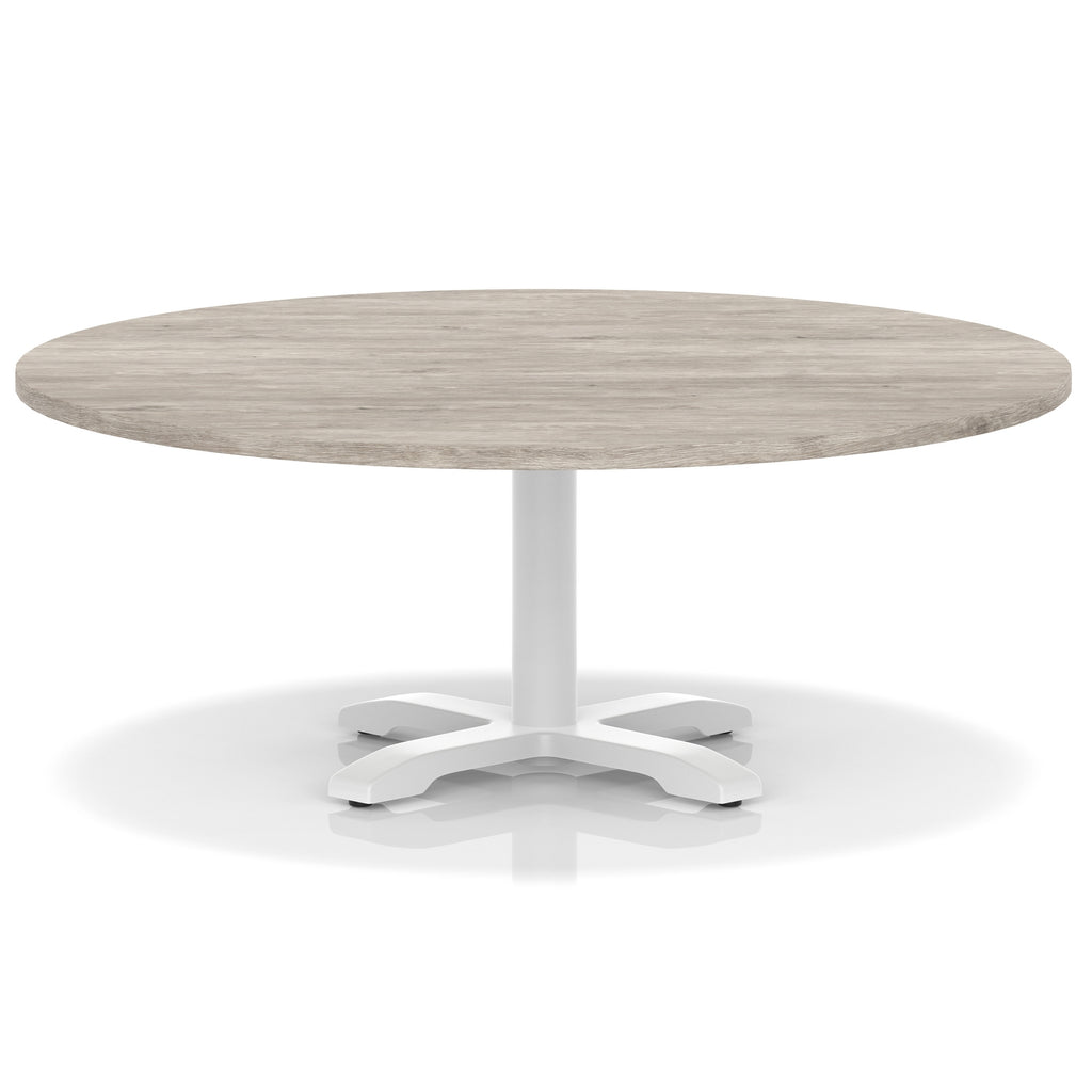 Round coffee table with grey wood-effect top and white metal base on a white background