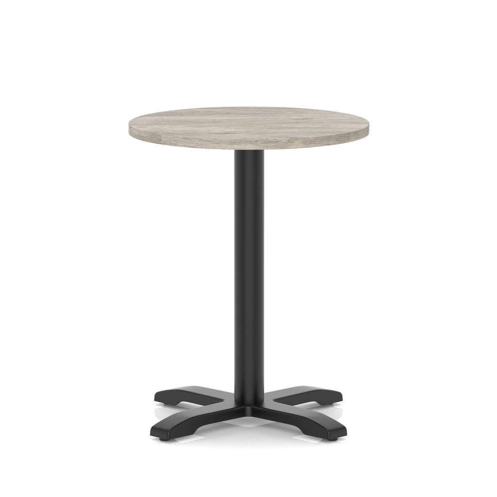 Round table with a grey wood-effect top and black base on a white background