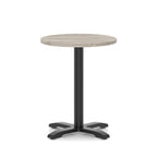 Round table with a grey wood-effect top and black base on a white background
