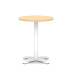 Round table with wood-effect top and white base on a white background