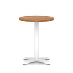 Round table with wood-effect top and white base on a white background