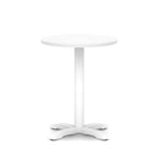 White round table with metal base on a white background