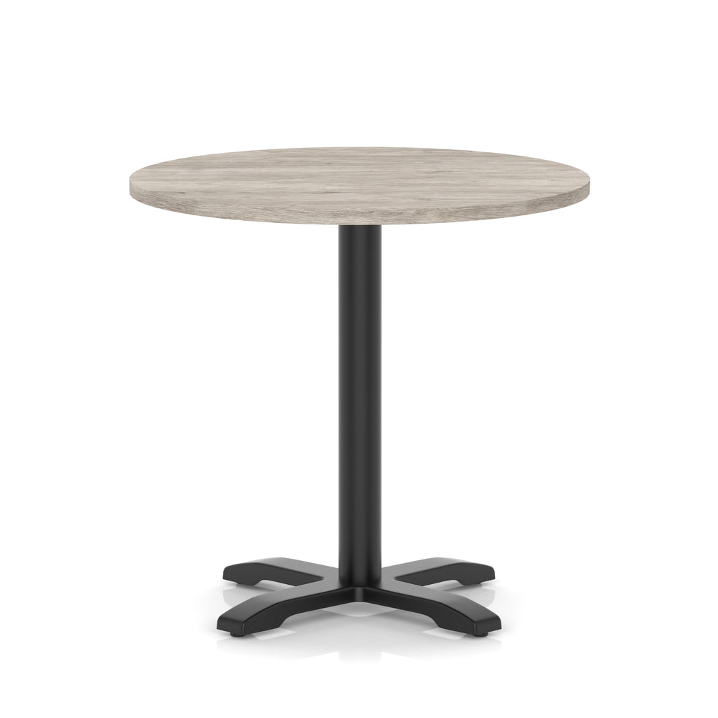 Round table with a grey wood-effect top and black base on a white background