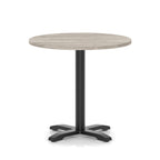 Round table with a grey wood-effect top and black base on a white background