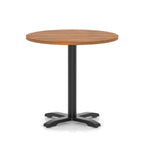 Round table with a wood-effect top and black base on a white background