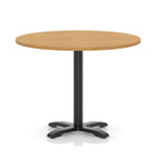 Round table with a wood-effect top and black base on a white background