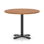 Round table with a wood-effect top and black base on a white background