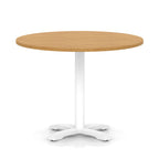 Round table with wood-effect top and white base on a white background