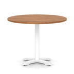 Round table with wood-effect top and white base on a white background