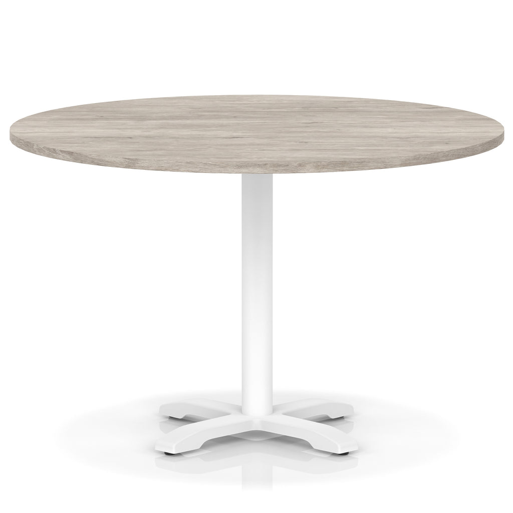 Round table with grey wood-effect top and white base on a white background