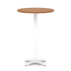 Round high table with wood-effect top and white base on a white background