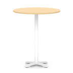 Round high table with wood-effect top and white base on a white background