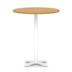 Round high table with wood-effect top and white base on a white background