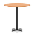 Round high table with a grey wood-effect top and black base on a white background