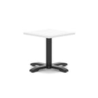 A square coffee table with a white top and a black pedestal base with a four-star cross design, shown on a solid white background.