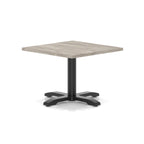 Square coffee table with grey wood-effect top and black metal base on a white background