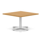 Square coffee table with wood-effect top and white metal base on a white background