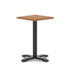 Square table with wood-effect top and black metal base on a white background