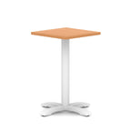 Square table with wood-effect top and white metal base on a white background