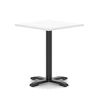 White table with a black metal base on a white background