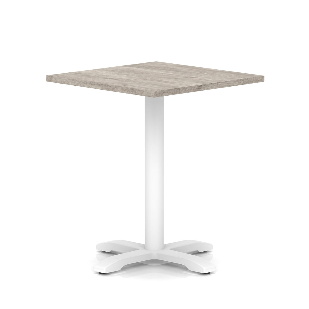 Square table with grey wood-effect top and white metal base on a white background