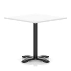 White table with a black metal base on a white background