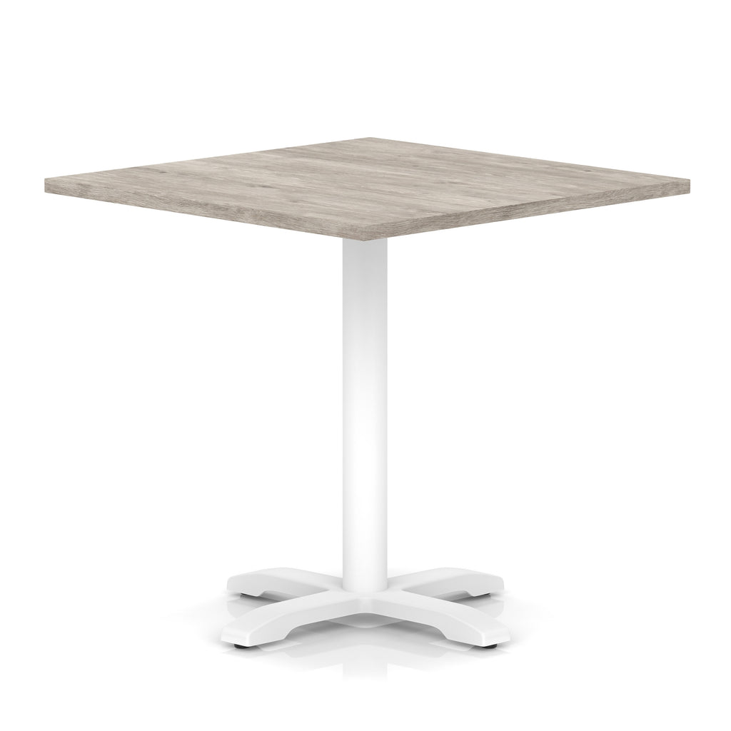 Square table with grey wood-effect top and white metal base on a white background