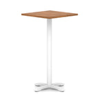 Square high table with wood-effect top and white metal base on a white background