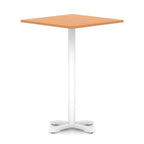 Square high table with wood-effect top and white metal base on a white background